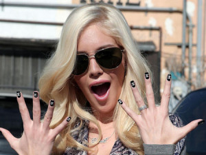 **EXCLUSIVE** Heidi Montag has her nails painted with the Chanel Logo before going shopping at Chanel in Beverly Hills