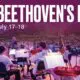 Outdoor orchestra on a stage performing Beethoven's Ninth at the Deer Valley Music Festival; festival branding is visible in the corner.