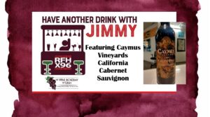 Post 04242026 - X96 Promotional banner: 'Have Another Drink with Jimmy' featuring Caymus Vineyards Cabernet Sauvignon, California (bottle image on right).