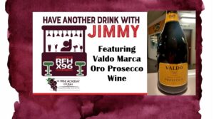 Post 05012026 - X96 Promotional banner for a show: 'Have Another Drink with Jimmy' featuring Valdo Marca Oro Prosecco wine, with a bottle image on the right and logos on the left.