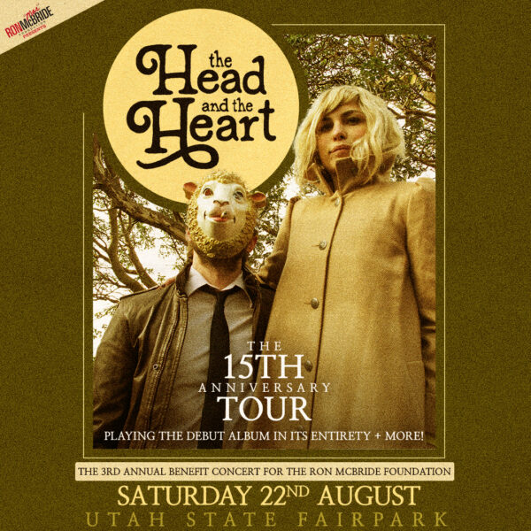 Poster for The Head and the Heart's 15th Anniversary Tour, featuring a masked figure and a blonde person in a tan coat under a yellow circle logo.