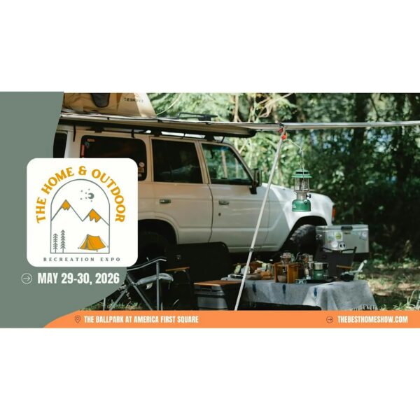 Outdoor recreation expo booth set up next to an SUV, with camping gear and a large The Home & Outdoor Recreation Expo sign.”